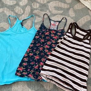 THREE razor back tanks